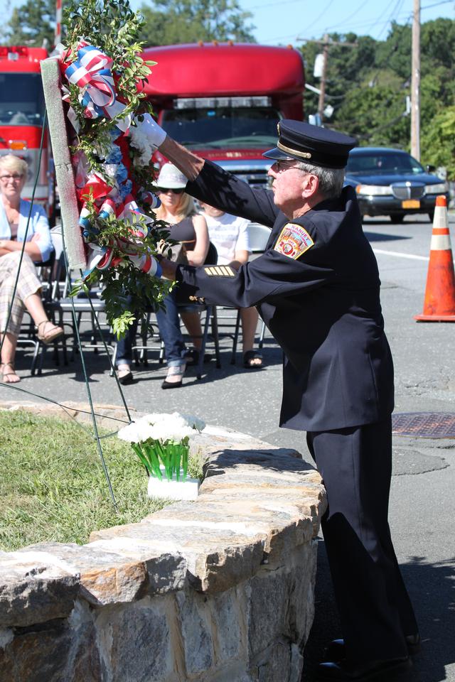 Flower placed for members from 186o to 1920 by Jack Reilly.

Memorial Service NFD. September 9, 2012. Photo by Vincent P. Tuzzolino